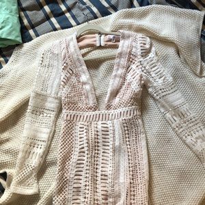 Misduided deep V dress. White